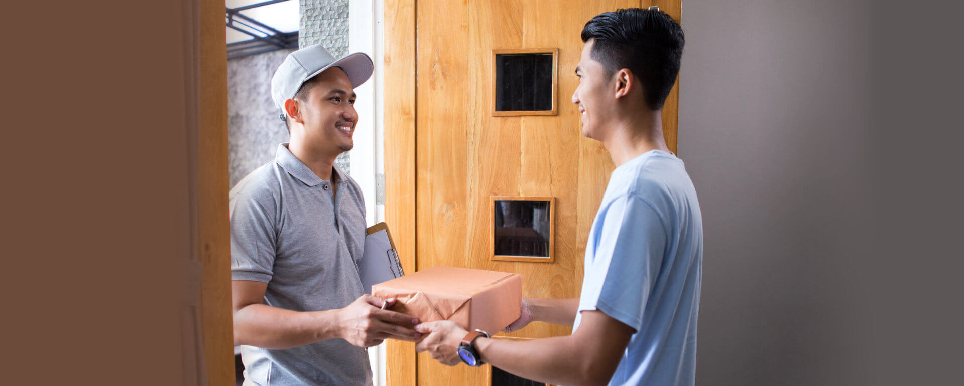 man delivering the package that the man ordered